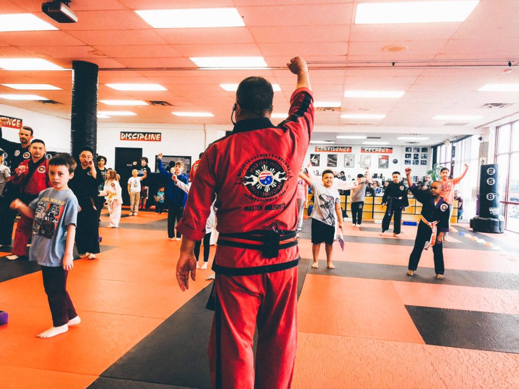 Instructor teaching martial arts